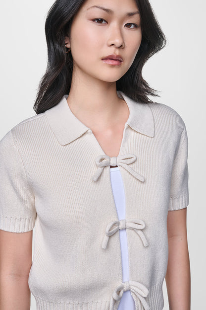 SHORT SLEEVE TIE FRONT POLO SWEATER