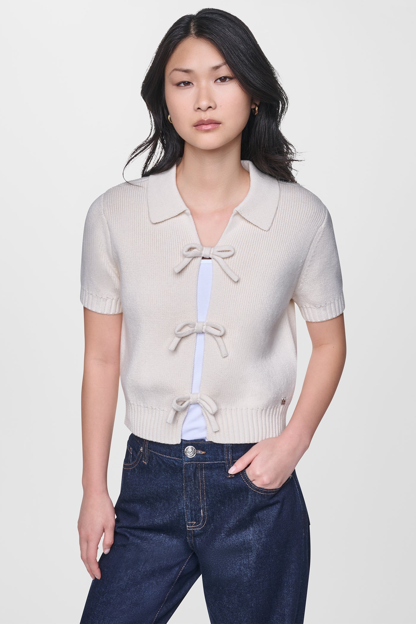 SHORT SLEEVE TIE FRONT POLO SWEATER