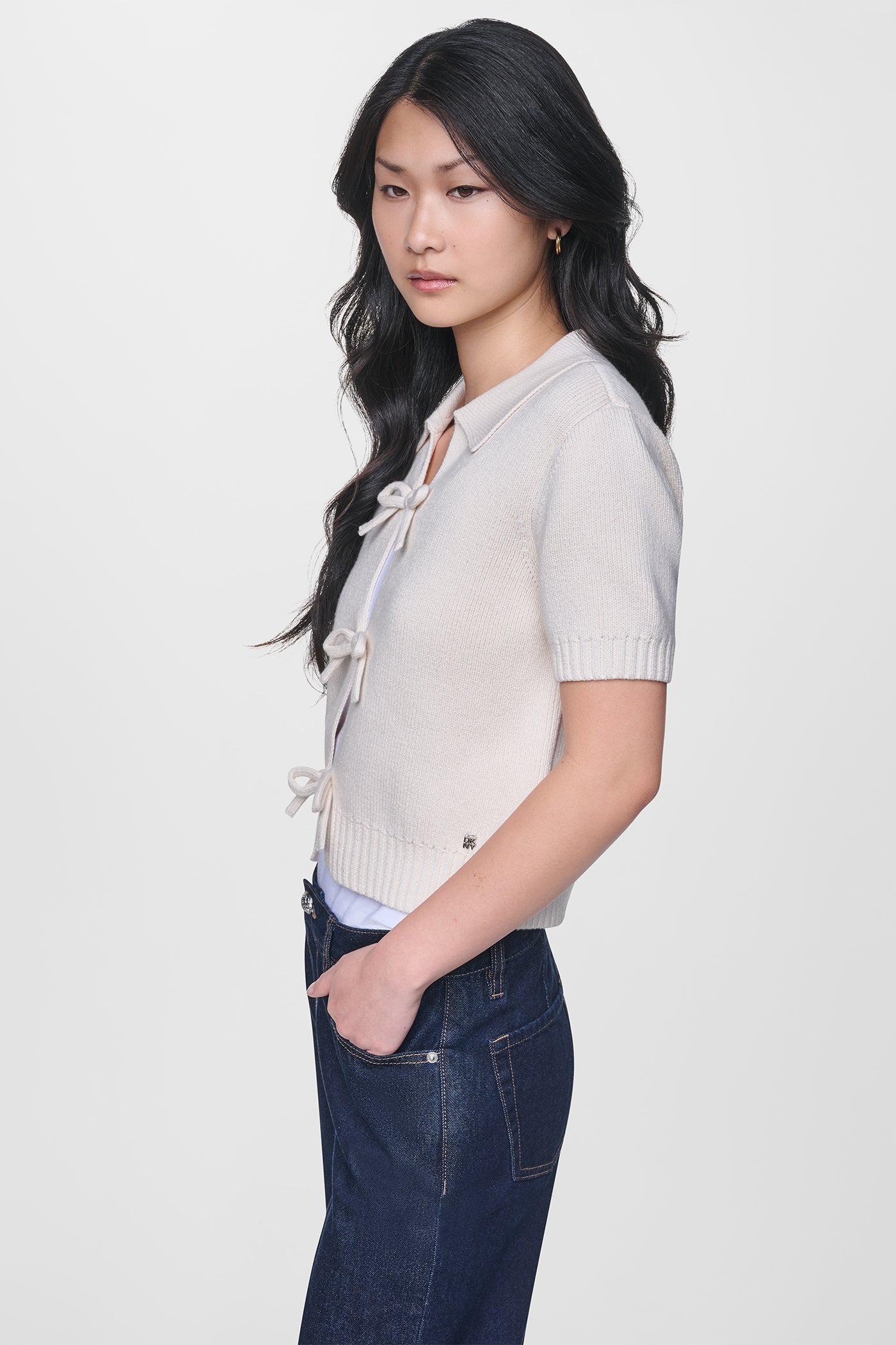 SHORT SLEEVE TIE FRONT POLO SWEATER