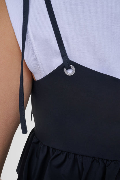 PEPLUM TANK WITH TIED STRAPS