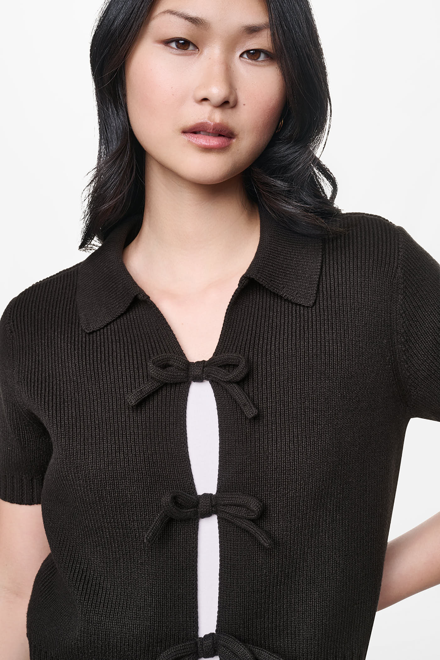 SHORT SLEEVE TIE FRONT POLO SWEATER