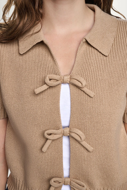 SHORT SLEEVE TIE FRONT POLO SWEATER
