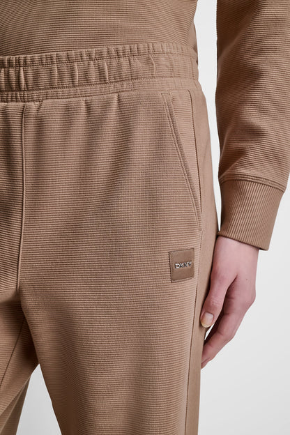 HIGH-RISE RIB TRACK PANTS