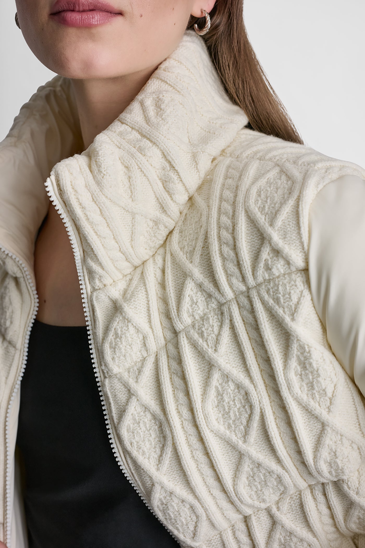 CABLE KNIT MOCK NECK PUFFER JACKET