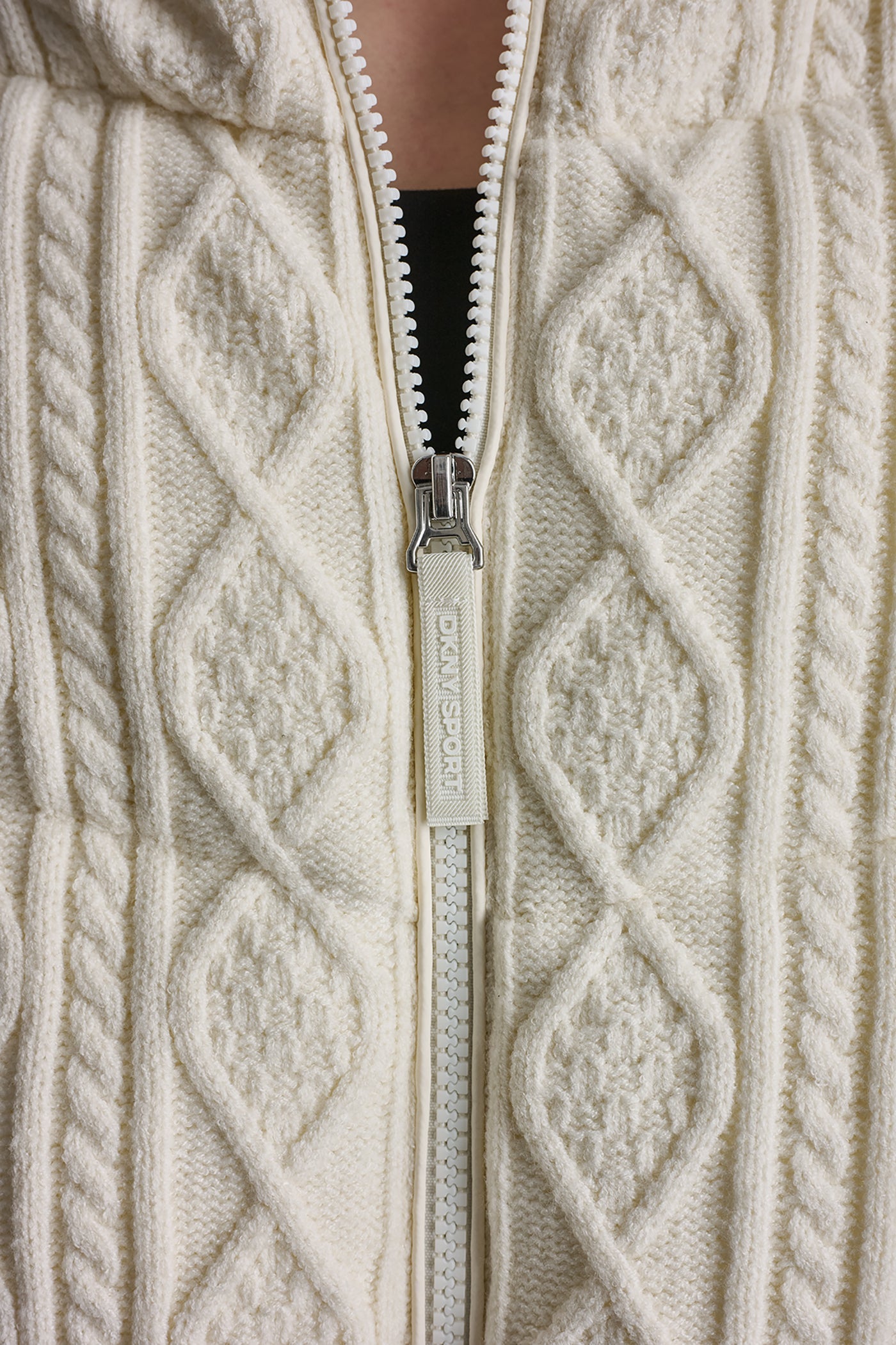 CABLE KNIT MOCK NECK PUFFER JACKET