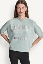COTTON-BLEND TERRY SHORT SLEEVE LOGO HIGH-LOW TEE