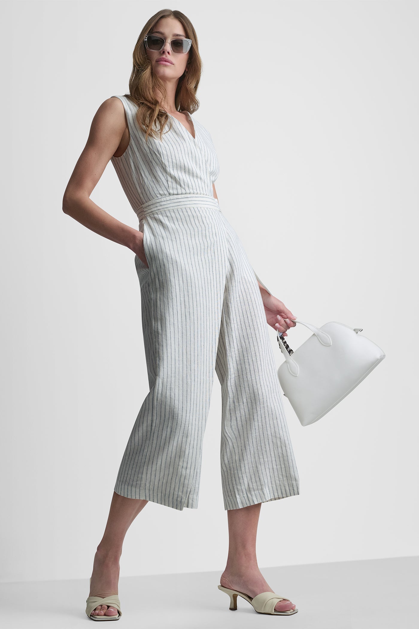 LINEN-BLEND SLEEVELESS WRAP-EFFECT V-NECK STRIPED JUMPSUIT